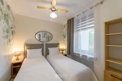 Łóżko lub łóżka w pokoju w obiekcie Apartament Kudowianka