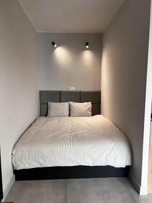 Łóżko lub łóżka w pokoju w obiekcie Property Apart – Legnicka Business Center