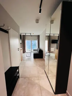 Łóżko lub łóżka w pokoju w obiekcie Property Apart – Legnicka Business Center