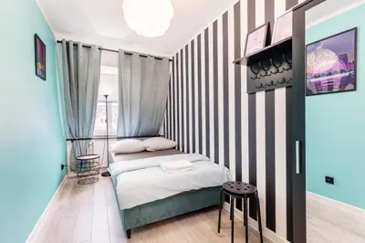 Łóżko lub łóżka w pokoju w obiekcie VICE CITY Hostel