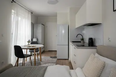 Kuchnia lub aneks kuchenny w obiekcie Symphony City Square Aparthotel