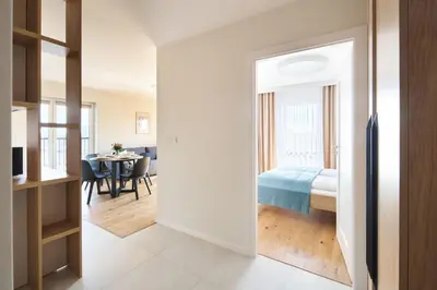 Łóżko lub łóżka w pokoju w obiekcie Symphony City Square Aparthotel