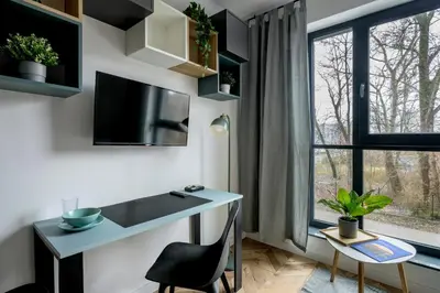 Telewizja i/lub zestaw kina domowego w obiekcie RentPlanet - Studio Fabryczna