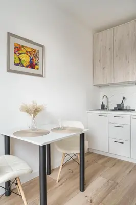 Kuchnia lub aneks kuchenny w obiekcie RentPlanet - Studio Fabryczna