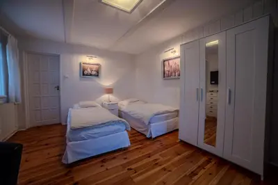 Łóżko lub łóżka w pokoju w obiekcie Ośrodek LBN-HUTA