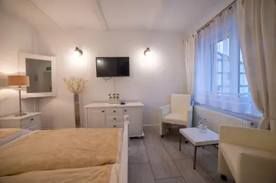 Łóżko lub łóżka w pokoju w obiekcie Ośrodek LBN-HUTA