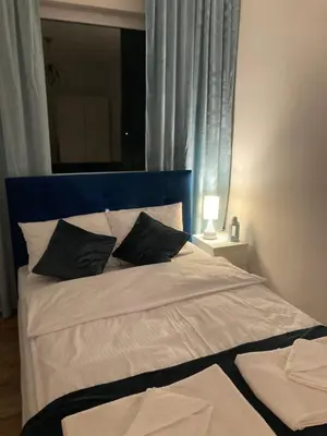 Łóżko lub łóżka w pokoju w obiekcie Tabago Studio 7