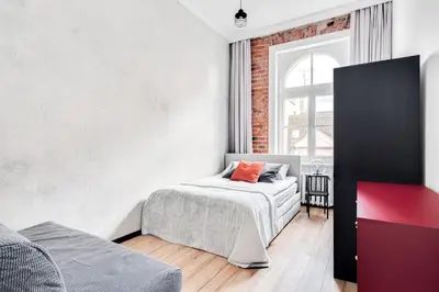Łóżko lub łóżka w pokoju w obiekcie Apartament Plac Jana Pawła 7 Centrum Wrocław