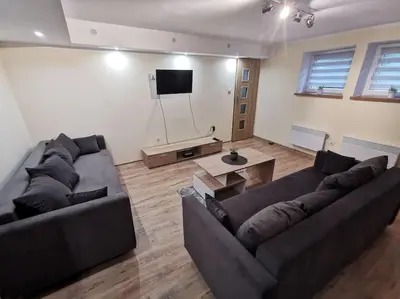 Telewizja i/lub zestaw kina domowego w obiekcie Apartament położony u podnóża Gór Bardzkich
