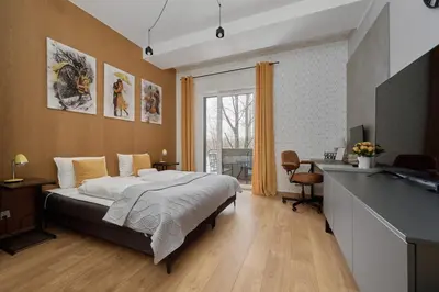 Łóżko lub łóżka w pokoju w obiekcie Marina Na Grobli Studio Apartments by Noclegi Renters