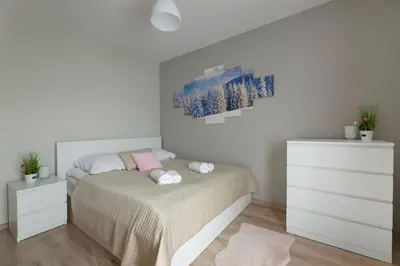 Łóżko lub łóżka w pokoju w obiekcie Zielony Zakątek