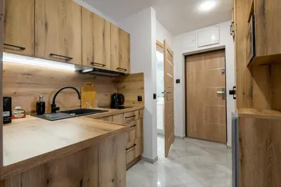 Kuchnia lub aneks kuchenny w obiekcie Apartament Centrum A