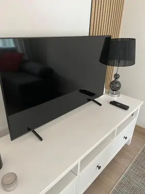 Telewizja i/lub zestaw kina domowego w obiekcie Komfort w Centrum Parking