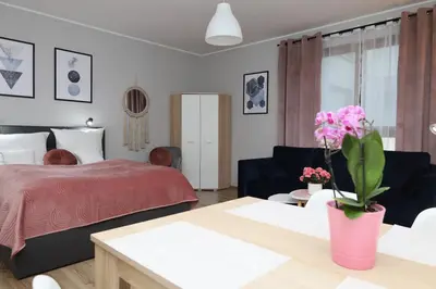Łóżko lub łóżka w pokoju w obiekcie Lucky-Time pl - 35 - Ostrów Tumski