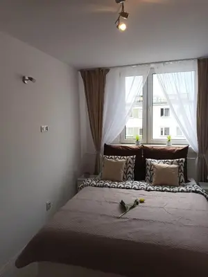 Łóżko lub łóżka w pokoju w obiekcie Apartament u Ani