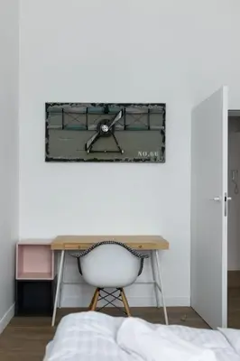 Łóżko lub łóżka w pokoju w obiekcie Apartament Majowy w Centrum Kudowy