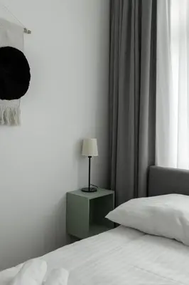 Łóżko lub łóżka w pokoju w obiekcie Apartament Majowy w Centrum Kudowy