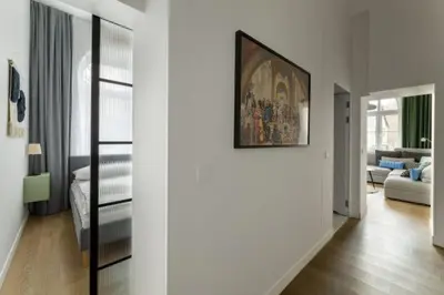 Łóżko lub łóżka w pokoju w obiekcie Apartament Majowy w Centrum Kudowy