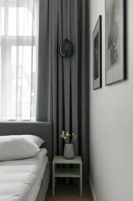 Łóżko lub łóżka w pokoju w obiekcie Apartament Majowy w Centrum Kudowy