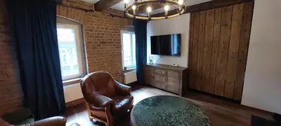 Telewizja i/lub zestaw kina domowego w obiekcie Apartament loftowy