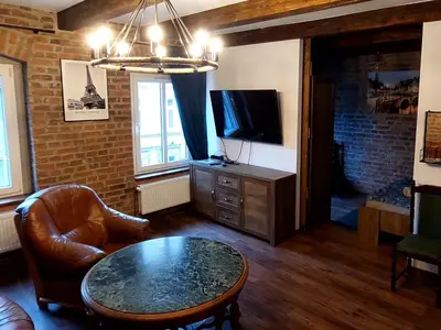 Telewizja i/lub zestaw kina domowego w obiekcie Apartament loftowy