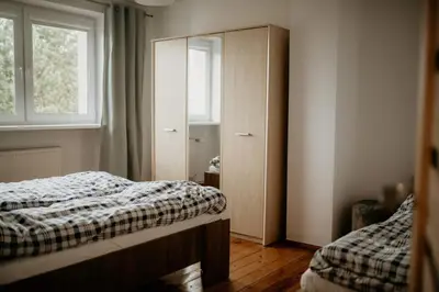 Łóżko lub łóżka w pokoju w obiekcie Dom na Lawendowej