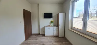 Telewizja i/lub zestaw kina domowego w obiekcie Zajazd Stronie