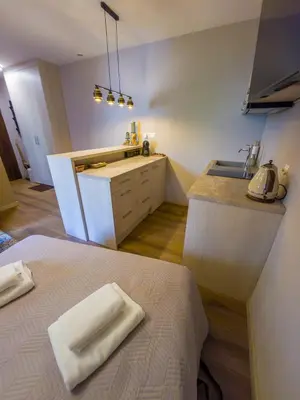 Łóżko lub łóżka w pokoju w obiekcie LIKE HOME 3 CENTRUM RYNEK