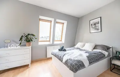 Łóżko lub łóżka w pokoju w obiekcie NiceOne Apartment Number 7 - W samym Centrum!