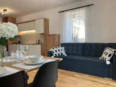 Część wypoczynkowa w obiekcie nowy apartament Płomykówka w Willi Sowiej
