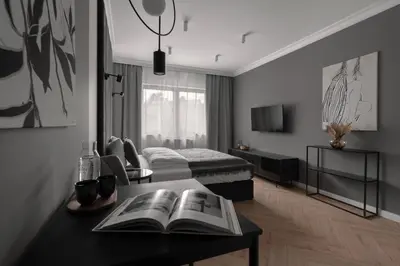 Łóżko lub łóżka w pokoju w obiekcie APARTIO ROOMS Gliwice