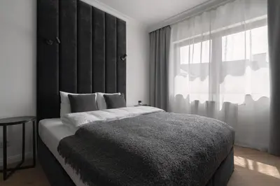 Łóżko lub łóżka w pokoju w obiekcie APARTIO ROOMS Gliwice