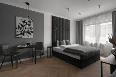 Łóżko lub łóżka w pokoju w obiekcie APARTIO ROOMS Gliwice