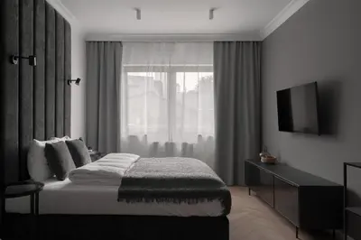 Łóżko lub łóżka w pokoju w obiekcie APARTIO ROOMS Gliwice