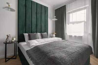 Łóżko lub łóżka w pokoju w obiekcie APARTIO ROOMS Gliwice
