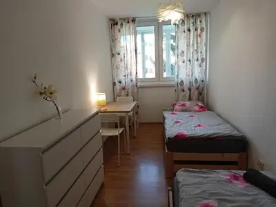 Łóżko lub łóżka w pokoju w obiekcie Lemuria Jawor pokoje