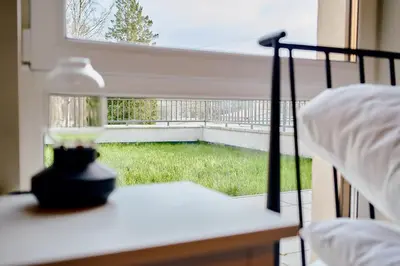 Łóżko lub łóżka w pokoju w obiekcie LAGUNA Villa Fonte 4