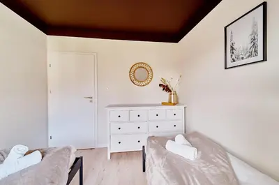 Łóżko lub łóżka w pokoju w obiekcie LAGUNA Villa Fonte 4