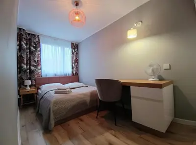 Łóżko lub łóżka w pokoju w obiekcie Apartament Kotlina
