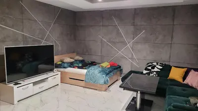 Telewizja i/lub zestaw kina domowego w obiekcie Apartament Dubaj