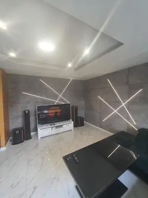 Telewizja i/lub zestaw kina domowego w obiekcie Apartament Dubaj