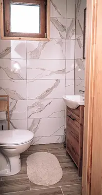 Łazienka w obiekcie Górskie Chatki Krysi i Piotrka Bursztynowy