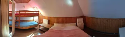 Łóżko lub łóżka w pokoju w obiekcie Przy Kominku Polanica-Zdrój