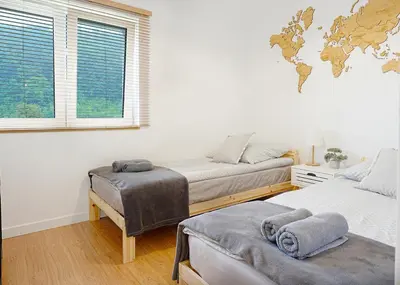 Łóżko lub łóżka w pokoju w obiekcie Apartament na Wzgórzu