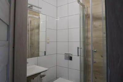 Łazienka w obiekcie Pokoje Pod Brzozą