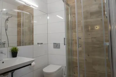 Łazienka w obiekcie Pokoje Pod Brzozą