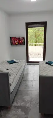 Łóżko lub łóżka w pokoju w obiekcie Apartament Świdnica