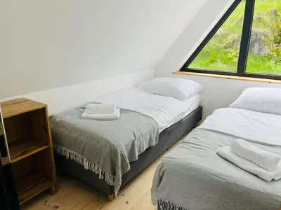 Łóżko lub łóżka w pokoju w obiekcie Apartament Na Szlaku