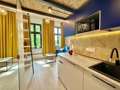 Kuchnia lub aneks kuchenny w obiekcie Loft Apartments Gliwice