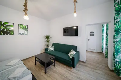 Telewizja i/lub zestaw kina domowego w obiekcie Jungle Vision Apartment - Rynek